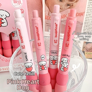 Macro shot of four pink retractable 0.5mm gel pens with dog illustrations and soft grip
