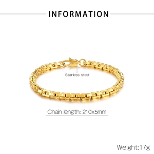 Detailed macro view of 210x5mm gold stainless steel chain bracelet with lobster clasp