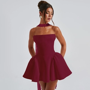 Close-up of wine red strapless mini dress with matching choker and flared skirt detail