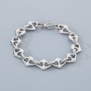 Detail shot of silver titanium steel bracelet with geometric diamond-shaped links