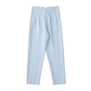Detailed flat lay of light blue straight-leg trousers with high-quality textured fabric