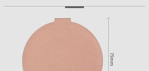 Close-up of pink leather textured round travel mirror with 75mm size dimension
