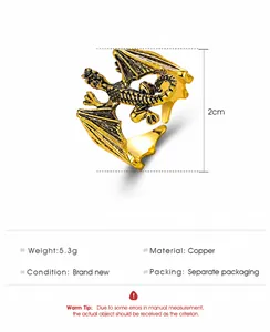 Detailed macro view of a golden dragon ring made of copper weighing 5.3g with scale textures