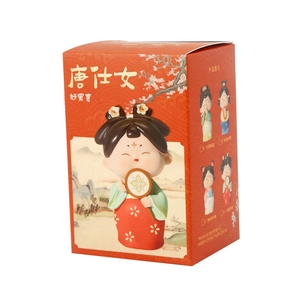 Macro view of Tang dynasty lady figurine packaging box with traditional Chinese patterns