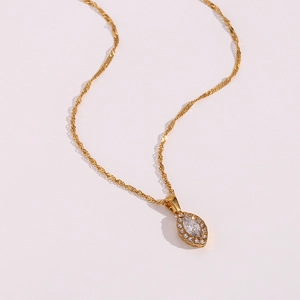 Golden stainless steel necklace with sparkling marquise zirconia leaf pendant for women