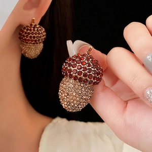 Vintage acorn stud earrings with brown and gold crystals in a luxury fashion setting