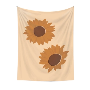 Detaillierte Stoffstruktur eines Wandteppichs mit zwei künstlerischen Sonnenblumenmotiven in Orange