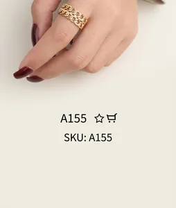 Detail of a vintage golden double-row chain ring worn on a finger for women