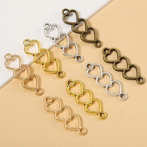 Three-heart hollow metal link connectors in multi-color finishes for DIY jewelry