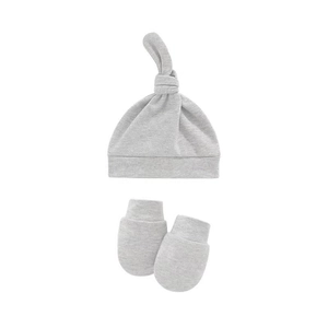 Detail of light gray soft cotton newborn knotted beanie and anti-scratch mittens set