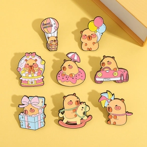 Set of 8 cute Capybara enamel pins with hot air balloon and donut designs on yellow backdrop
