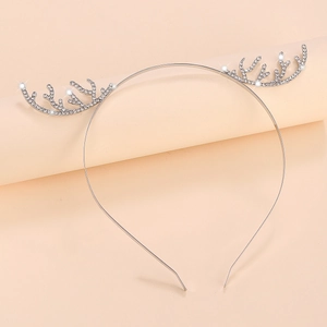 Glittering silver reindeer antler headband with sparkling rhinestones for Christmas party