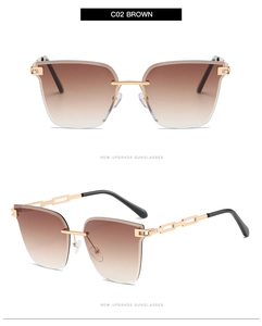 Detail of rimless square sunglasses with brown gradient lenses and gold chain temples