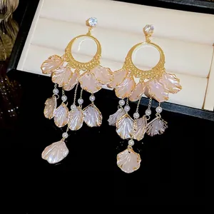 Pink petal fringe earrings with zircons and pearls on golden metal stud hangers