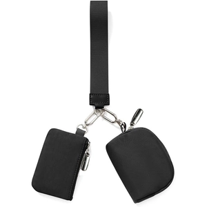 Detail of black nylon wristlet bag set with dual pouches and silver metal hardware