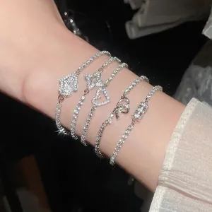 Elegant 5-piece silver tennis bracelet set with heart, clover, and bow zircon charms