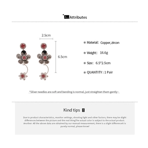 Detail view of flower tassel earrings with red zircon and silver needle dimensions