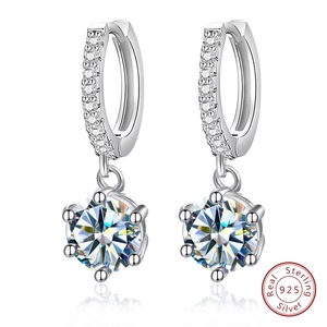 Detailed close-up of S925 sterling silver drop earrings with brilliant moissanite stones