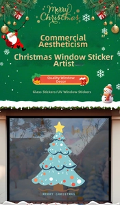 Detail of blue Christmas tree window sticker with Merry Christmas text on glass surface