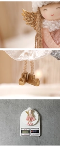 Detailed views of pink lace angel ornament showing embroidered face and 11g weight on scale