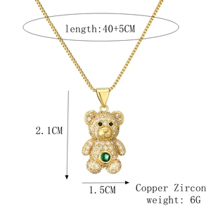 Detail of bear pendant with green zircon inlay and 40+5CM chain dimensions shown