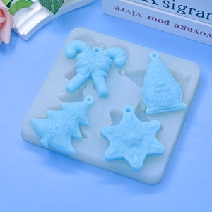 Christmas silicone mold set with Santa, tree, candy cane, and snowflake shapes for baking