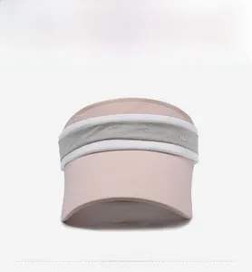 Detail of pink and gray contrast visor hat with white piping and NARAS logo