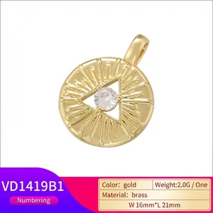 Gold hip hop brass pendant with evil eye heart design and sparkling crystal stone