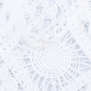 Elegant white hollow out lace polo shirt with long sleeves and wavy scallop hemline