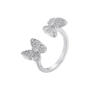 Detailed macro view of silver butterfly ring featuring micro-pave cubic zirconia stones