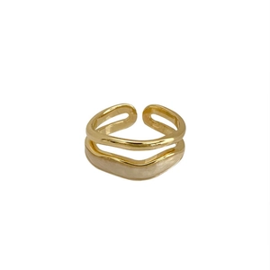 Minimalist double layer golden ring featuring a cream enamel octagonal pattern design