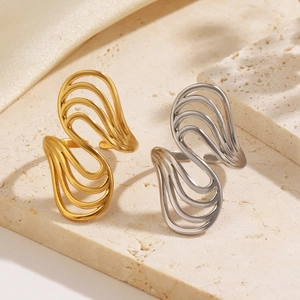 Exaggerated geometric wavy open rings in 18K gold and silver stainless steel set