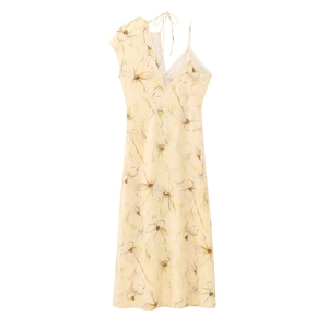 Robe longue fleurie jaune pâle avec licou, dos nu lacé et fente latérale fluide