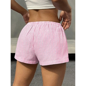 Back view of pink striped casual shorts for women featuring elastic waist and slim fit cut