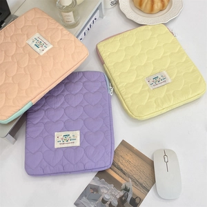 Detailed heart quilted tablet sleeve in pastel purple pink and yellow soft cotton