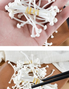 Macro shot of realistic white PVC enoki mushrooms bundled for food photography props