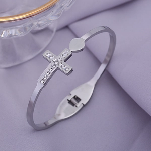 Double-layer silver stainless steel cross bracelet with sparkling heart zirconia accents