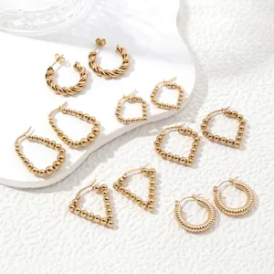 Set of 6 pairs gold geometric stainless steel hoop earrings with textured designs