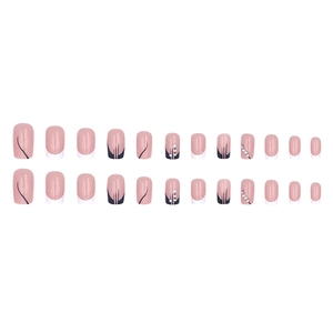 French tip press-on nails with navy blue accents and minimalist rhinestone nail art