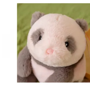 Close-up of cute panda plush toy with thick pink and grey fur and realistic eyes