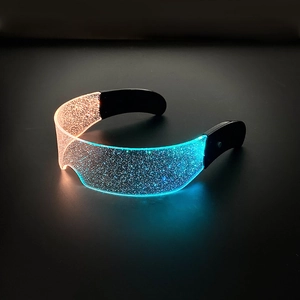 Futuristic LED luminous glasses with orange and blue gradient light effects on clear lenses