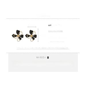 Detailed size specifications of matte black and gold double-layered flower earrings