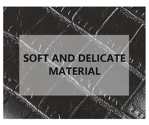 Macro shot of soft and delicate black crocodile embossed leather material for men's wallet