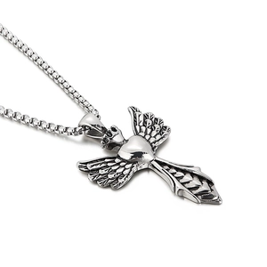 Silver stainless steel angel wing heart cross pendant necklace on white background