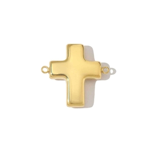 Détail d'un pendentif croix creuse en acier inoxydable doré avec deux boucles latérales