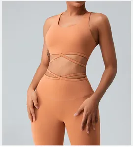 Detailed front view of women's sports set featuring cross-strap yoga bra and high waist leggings