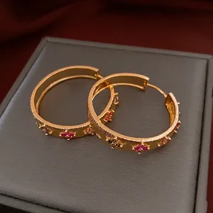 Gold-plated vintage style hoop earrings with brushed texture and colorful zircon flowers
