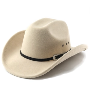 Detail of beige cowboy hat with black leather band, silver buckle and ventilation eyelets
