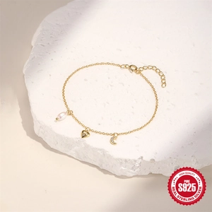 Elegant S925 sterling silver gold bracelet with heart, moon charm and pearl on stone