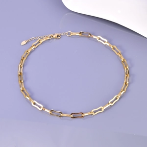 Detail of 18K gold stainless steel bracelet with geometric hollow rectangular links